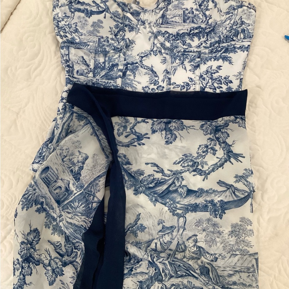 Swimsuit and beach wrap.